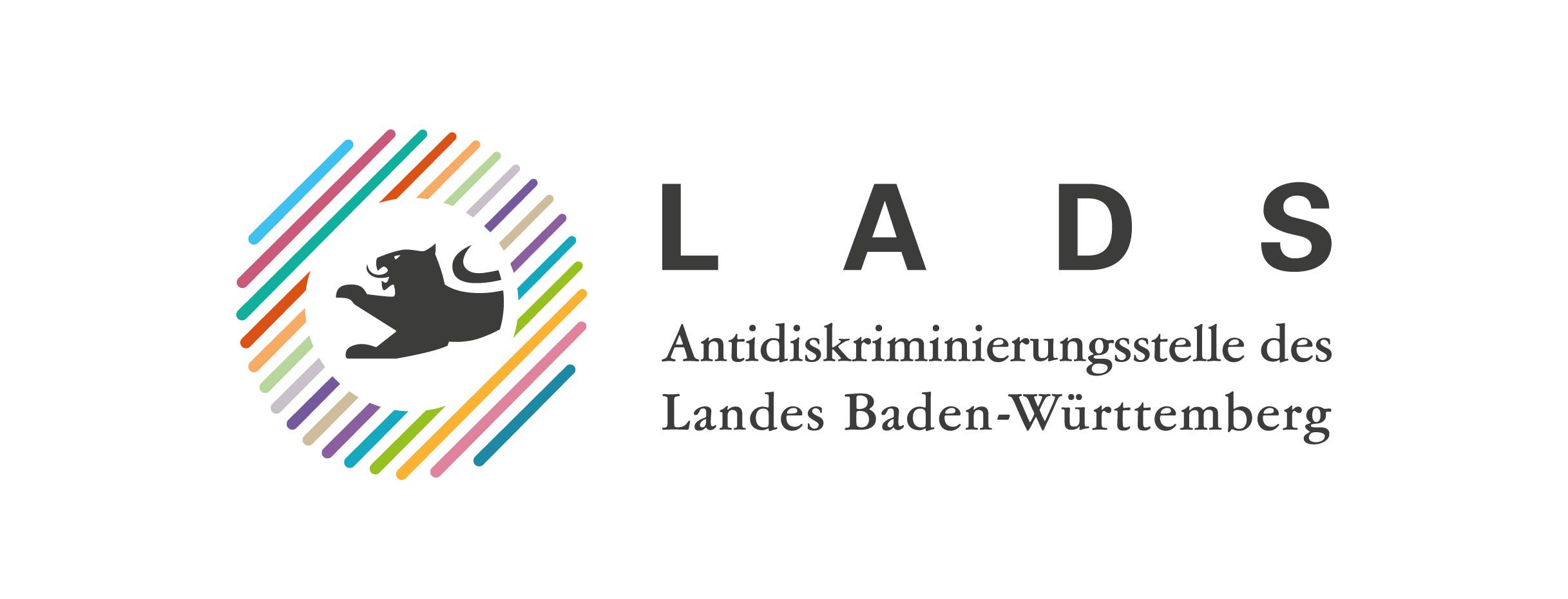 Grafik eines Löwen in einem Kreis aus bunten Strichen - Antidiskriminierungsstelle des Landes Baden-Württemberg (LADS)