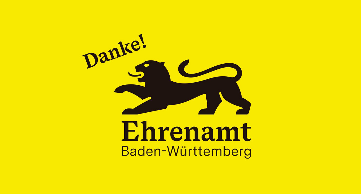 Mit verschiedenen Farben gefüllter Löwenumriss, umrahmt von Schriftzug: Danke! Ehrenamt Baden-Württemberg