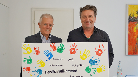 Stuttgarts Oberbürgermeister Fritz Kuhn und Sozial- und Integrationsminister Manne Lucha