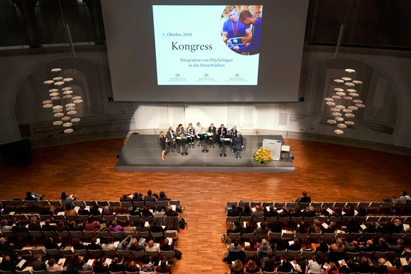 Voll besetzter Veranstaltungssaal im Haus der Wirtschaft in Stuttgart