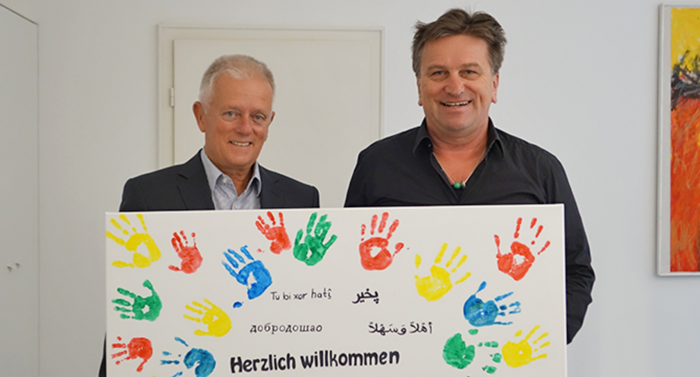 Stuttgarts Oberbürgermeister Fritz Kuhn und Sozial- und Integrationsminister Manne Lucha