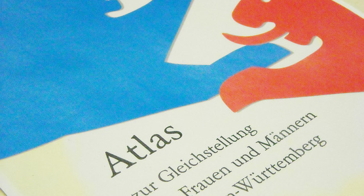 BW-Atlas-Coverbild mit zwei unterschiedlich eingefärbten Löwen